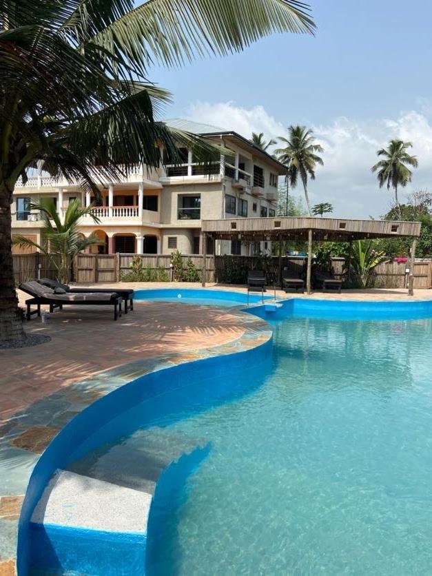 Hotel Afiki à Elmina Extérieur photo