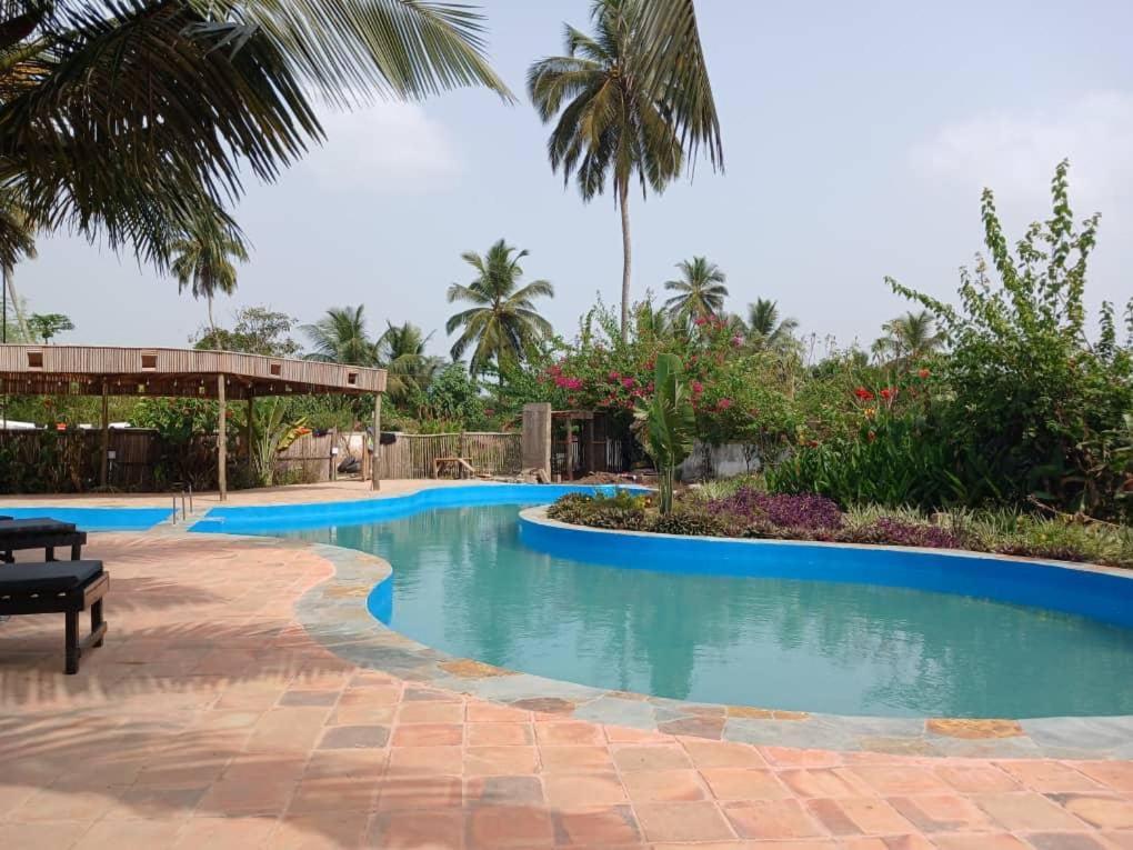 Hotel Afiki à Elmina Extérieur photo